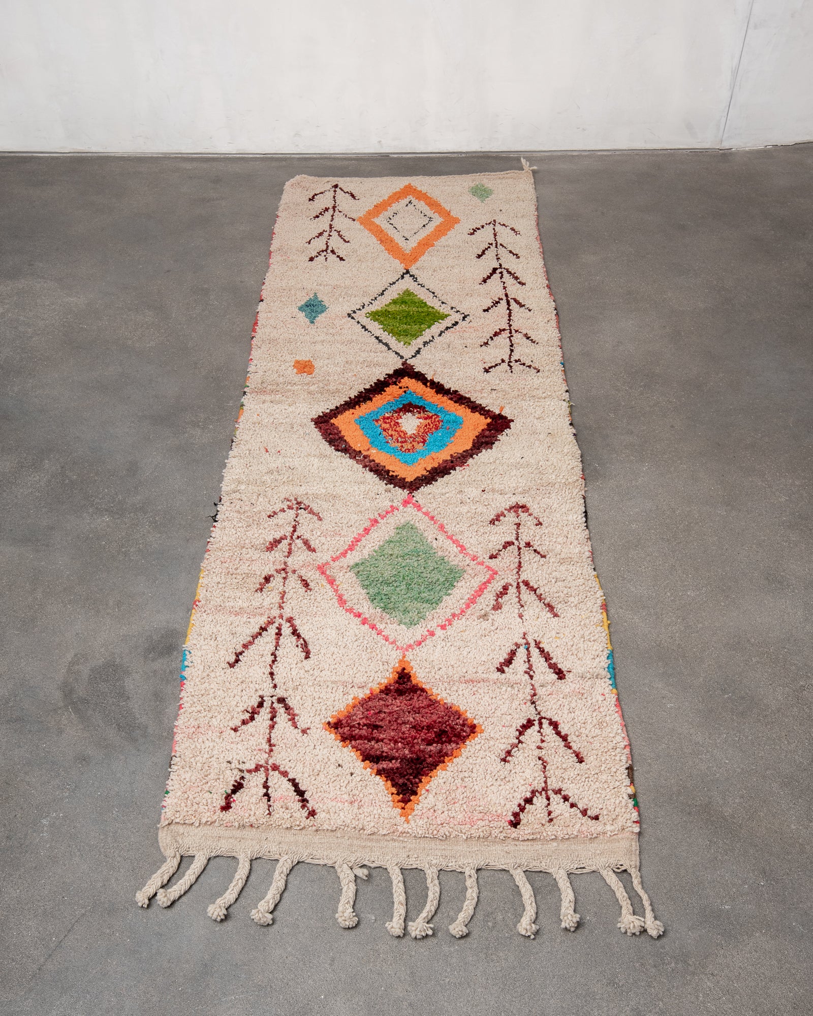 Modern designer handcrafted Berber runner rug from Morocco. Beniourain with beautiful colors and patterns.